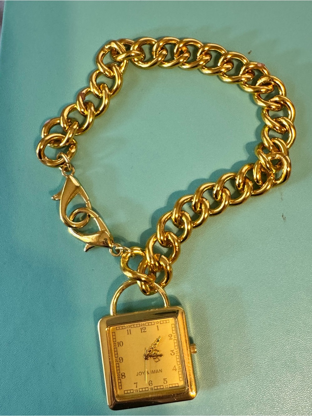 JOY & IMAN Gold Tone Charm Bracelet Watch